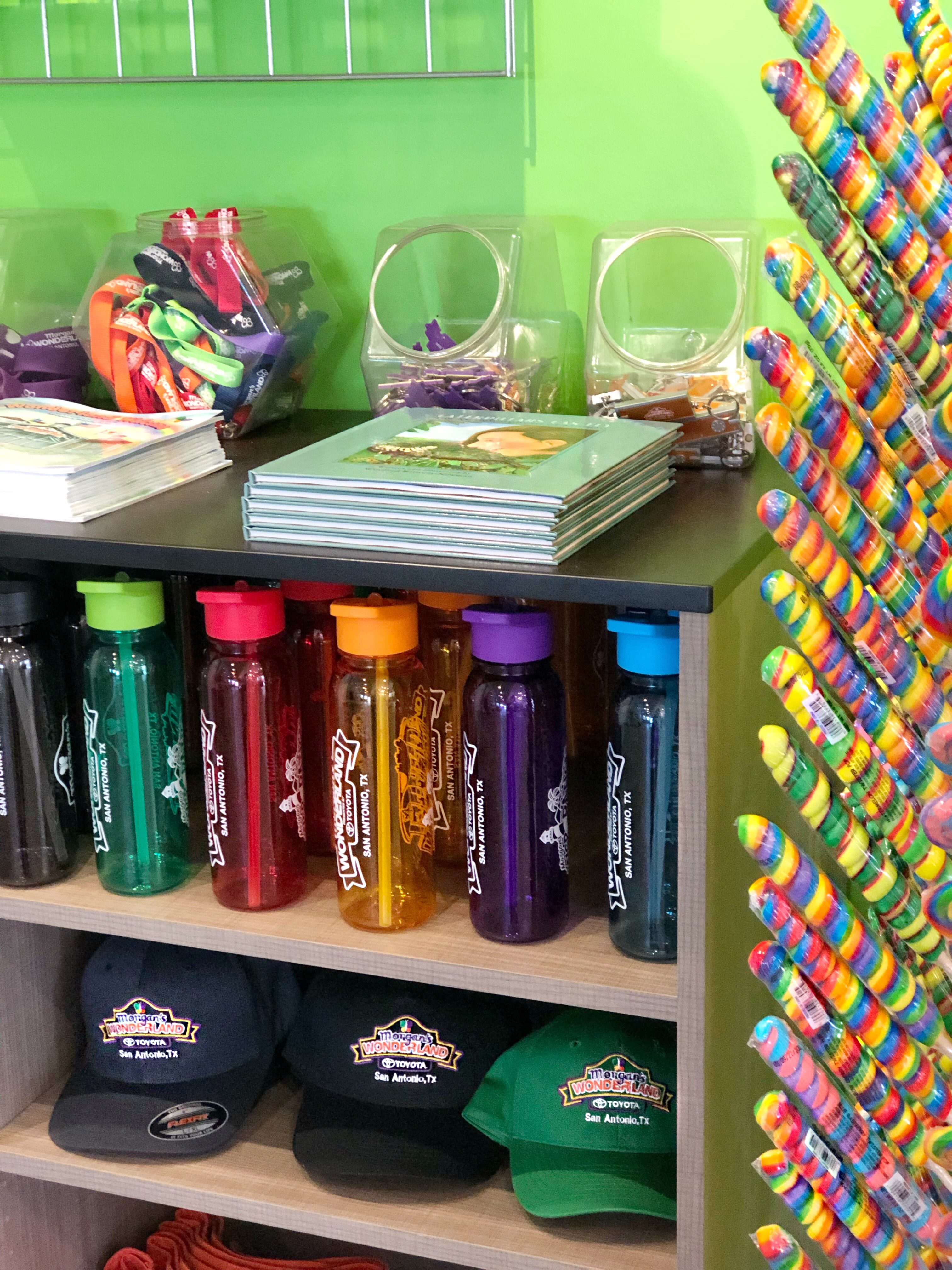 Water bottles and caps at the Squad Shoppe